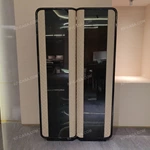Rounded-Corner Dark Wood Wine Cabinet with Tinted Glass Doors Quilted Beige Upholstered Panels and Interior Shelving